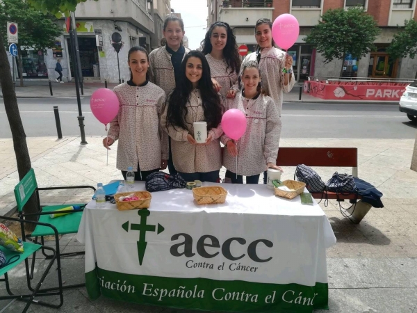 Colaborando con la Asociación Española Contra el Cáncer